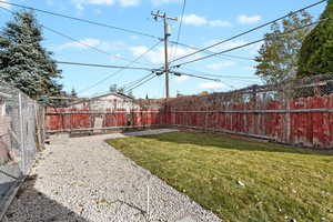 View of fenced backyard