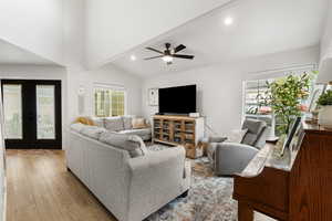 Living room featuring recessed lighting, light wood finished floors, french doors, and a ceiling fan