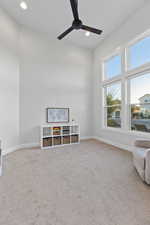Office with light colored carpet, recessed lighting, and a ceiling fan