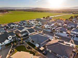 Aerial perspective of suburban area with a mountainous background