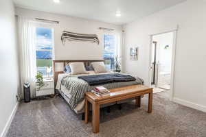 Master bedroom with more windows to take in that mountain view