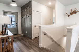 Great windowed front door with cute entry