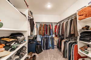 huge walk in closet in master bathroom