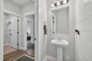 Half bathroom with pedestal sink