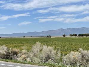 Mountain view featuring rural landscape and a pastoral area