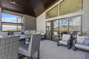 View of patio / terrace with a mountain view and outdoor dining space