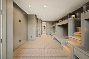 Mudroom with carpet flooring and recessed lighting