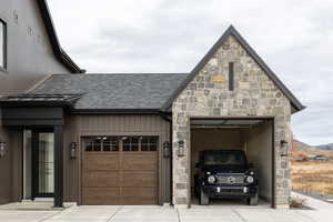 Garage featuring driveway