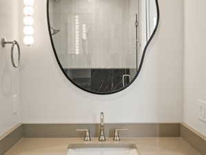 Full bathroom featuring vanity and a tile shower