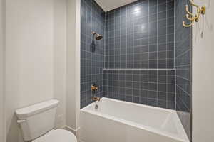 Full bath with toilet and bathing tub / shower combination