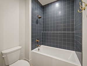 Full bath with toilet and bathing tub / shower combination