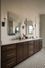 Bathroom featuring double vanity