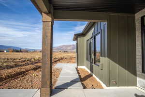 View of patio with a mountain view