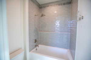 Bathroom with  shower combination and toilet