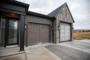 Garage featuring driveway