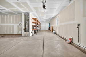 Garage featuring secured water heater