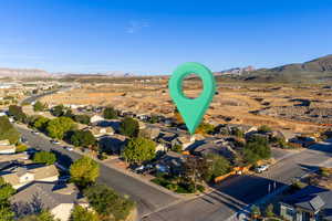 Aerial view of residential area with mountains