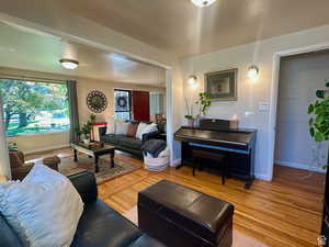 Living area featuring wood finished floors and baseboards