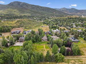 Aerial view of residential area featuring mountains