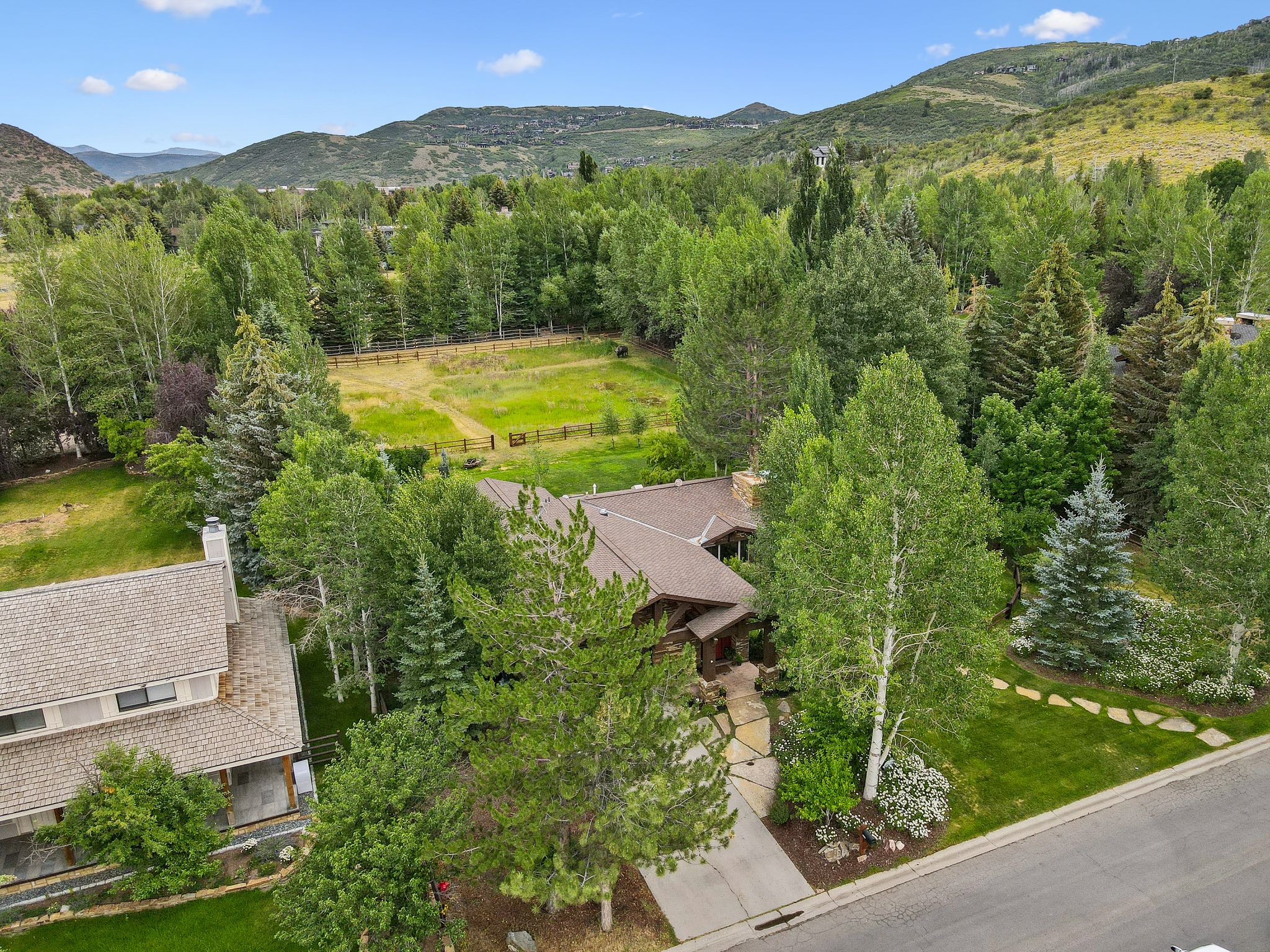 View of subject property with a mountainous background
