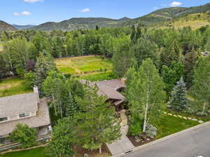 View of subject property with a mountainous background