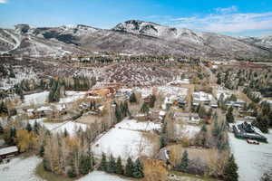 View of mountain background featuring nearby suburban area