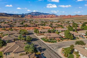 Aerial view of residential area featuring a mountain backdrop