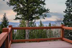 Wooden deck featuring a mountain view