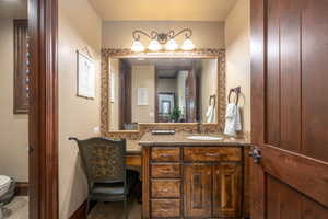 Bathroom with vanity and toilet