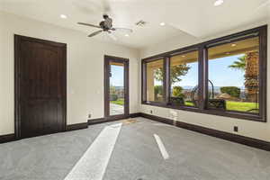 Unfurnished bedroom featuring carpet floors, a ceiling fan, recessed lighting, and access to outside