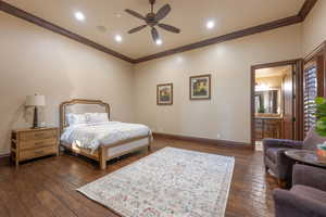 Bedroom featuring ornamental molding, dark wood-style floors, a ceiling fan, ensuite bathroom, and recessed lighting