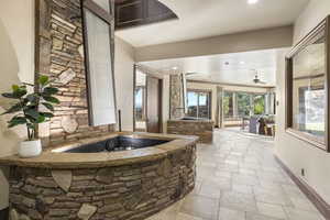 View of patio / terrace featuring a ceiling fan