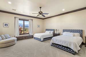 Bedroom with crown molding, carpet flooring, a ceiling fan, a mountain view, and recessed lighting