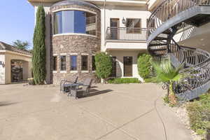 View of property featuring stairs