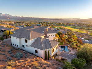 Aerial perspective of suburban area with a mountain backdrop