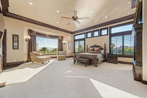 Carpeted bedroom featuring crown molding, recessed lighting, and a ceiling fan