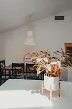 Dining room with vaulted  ceiling