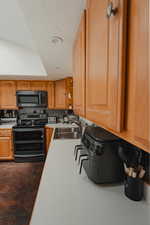 Kitchen featuring double oven range.