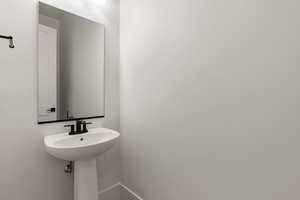 Bathroom featuring baseboards