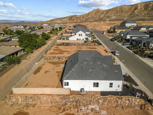 Aerial view of residential area with a mountain backdrop