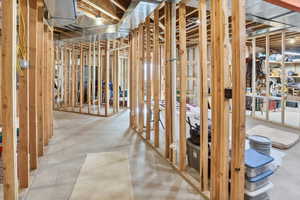 Miscellaneous room with concrete floors