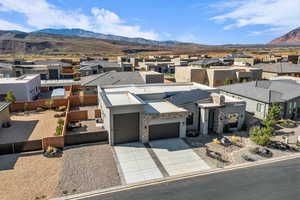 Aerial view of residential area with a mountainous background