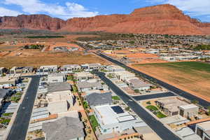 Aerial perspective of suburban area with mountains