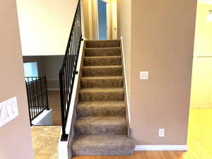 Stairs from kitchen to the upstairs bedrooms.