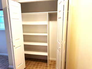 View of closet just off laundry room.