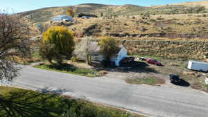 View from above of property featuring a mountainous background