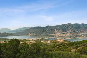 View of mountain backdrop with a nearby body of water