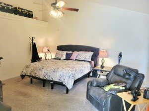 Bedroom featuring carpet floors and ceiling fan