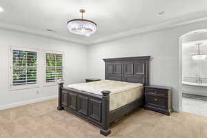 Bedroom with a chandelier, light colored carpet, crown molding, recessed lighting, and a textured ceiling
