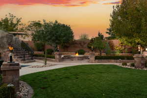 Fenced backyard featuring a patio area and stairway